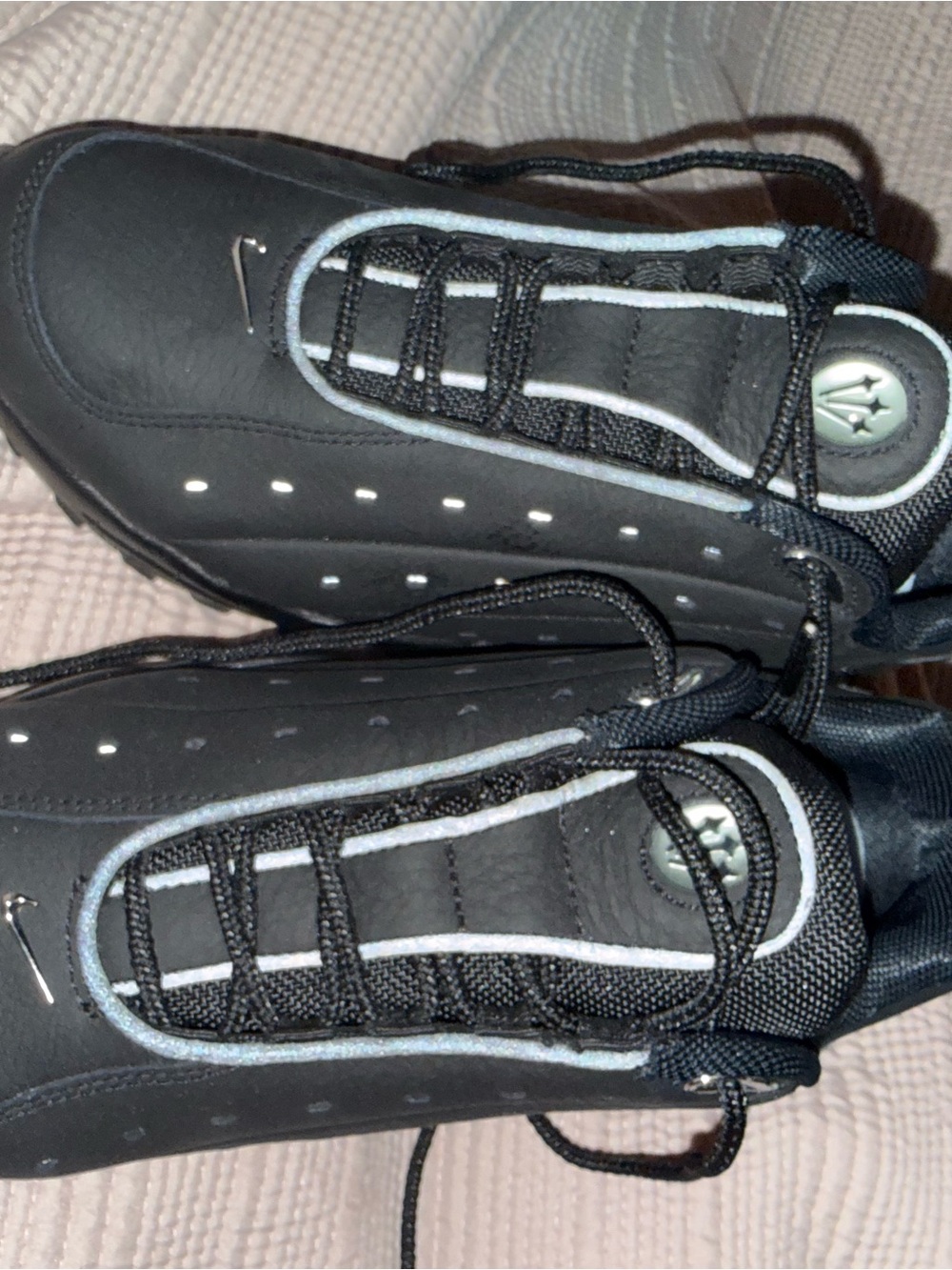 Nike Men's Black Sneakers with Reflective Silver Accents